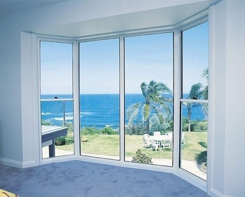 Professional services by Masterjack Windows and Doors Window looking out on the ocean