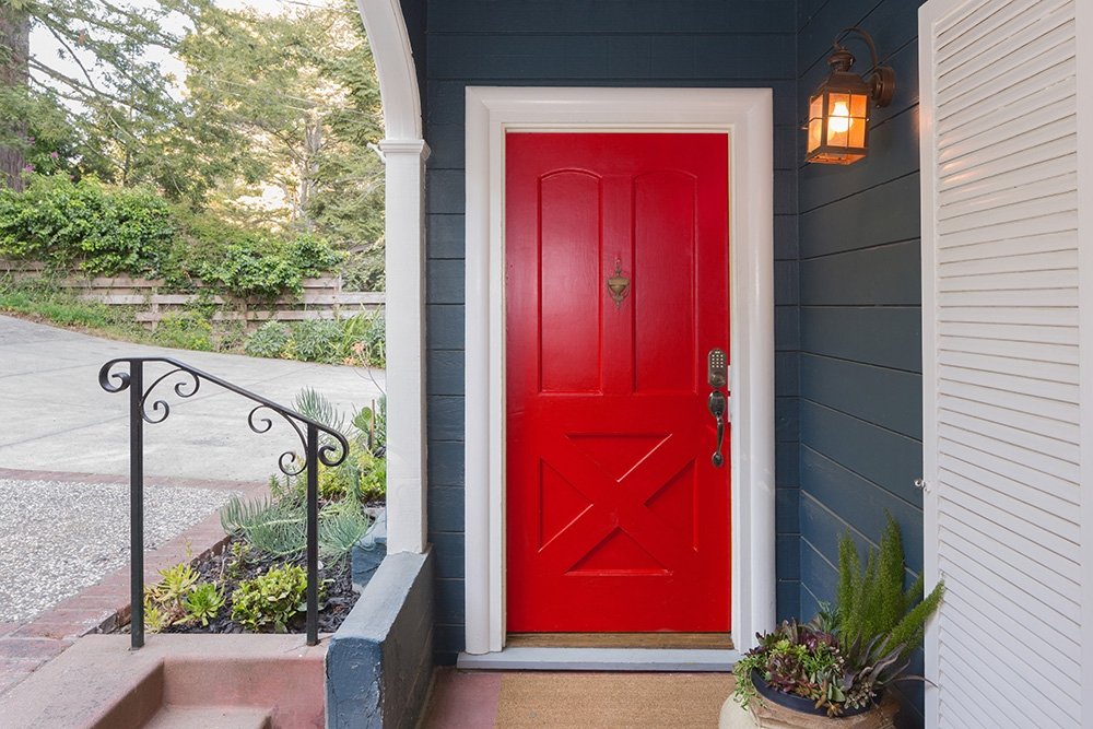 Red entry Door to a house